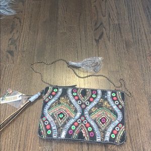 Multicolor clutch from Steven madden